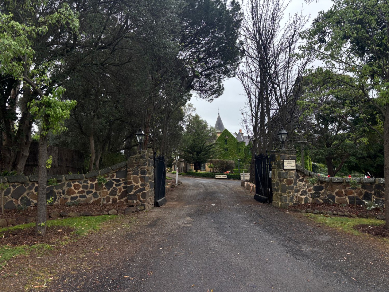 The bluestone gates and tree-lined drive at Overnewton Castle, Keilor.